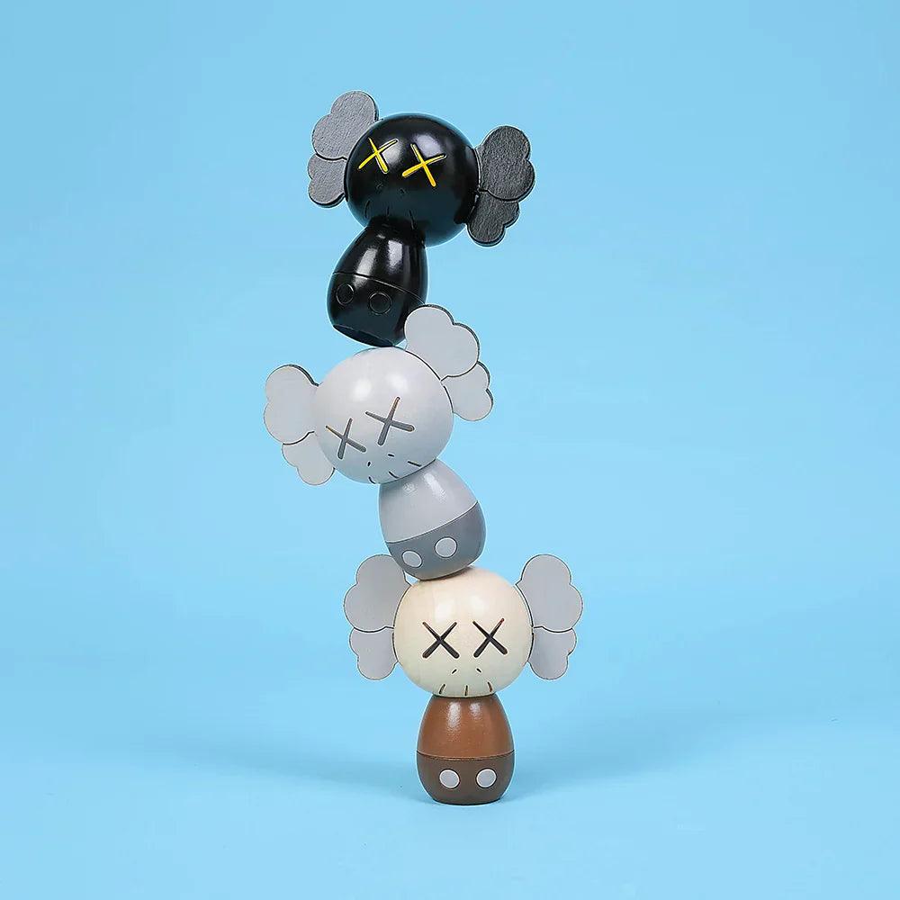 KAWS-KAWS:HOLIDAY JAPAN Limited Kokeshi Doll Set (Set of 3)