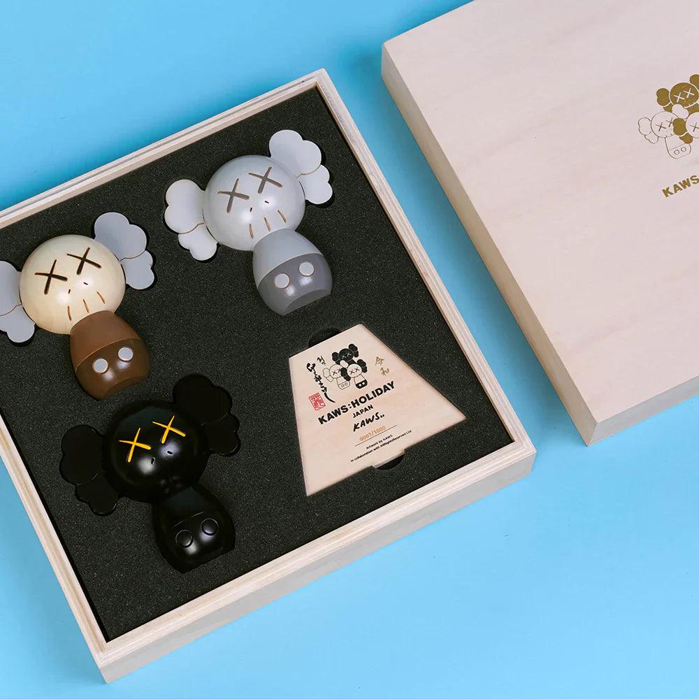 KAWS-KAWS:HOLIDAY JAPAN Limited Kokeshi Doll Set (Set of 3)